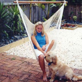 Lady with a dog in the Mexican Cotton Hammock Chair